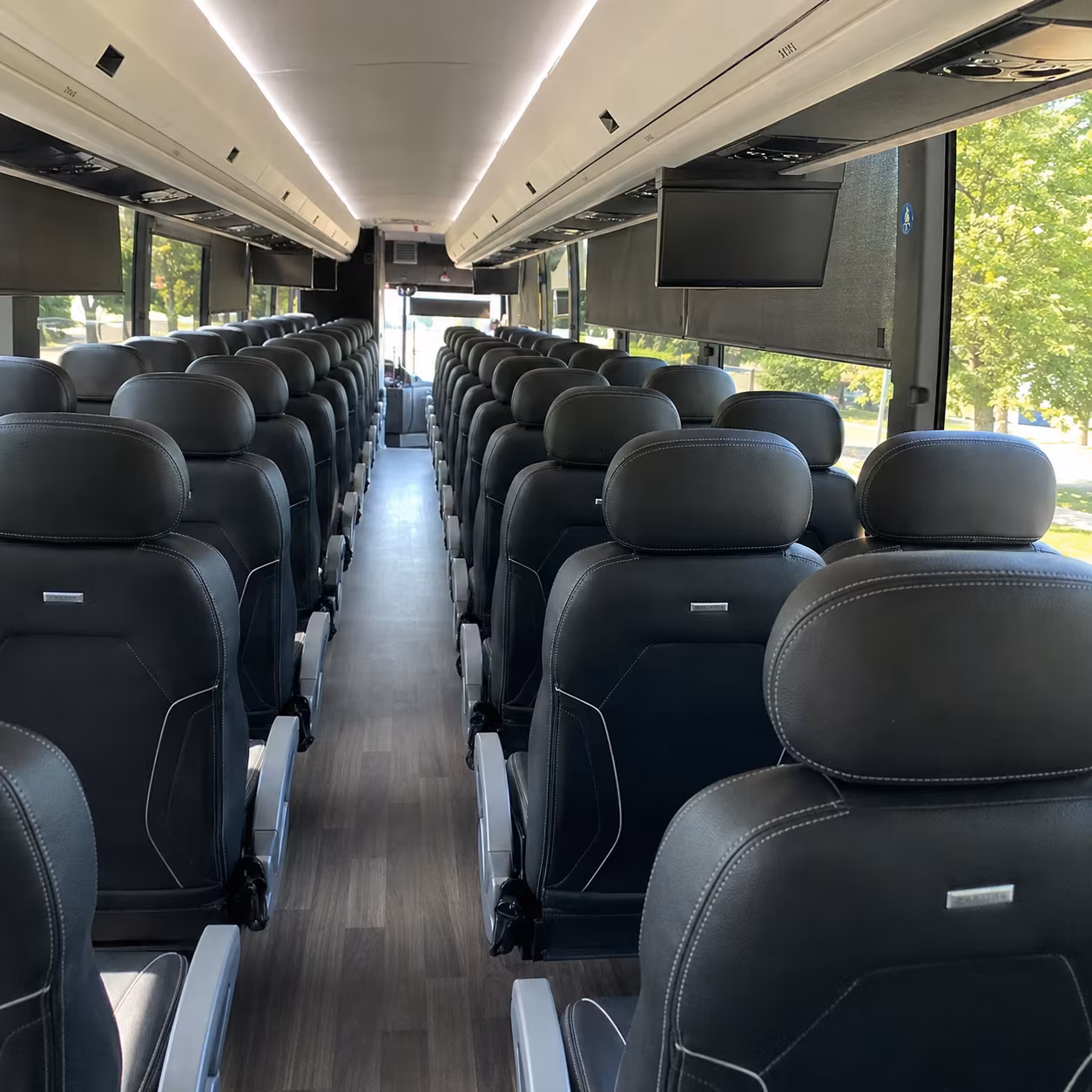 charter bus shuttle service for denton manufacturing and warehouse groups